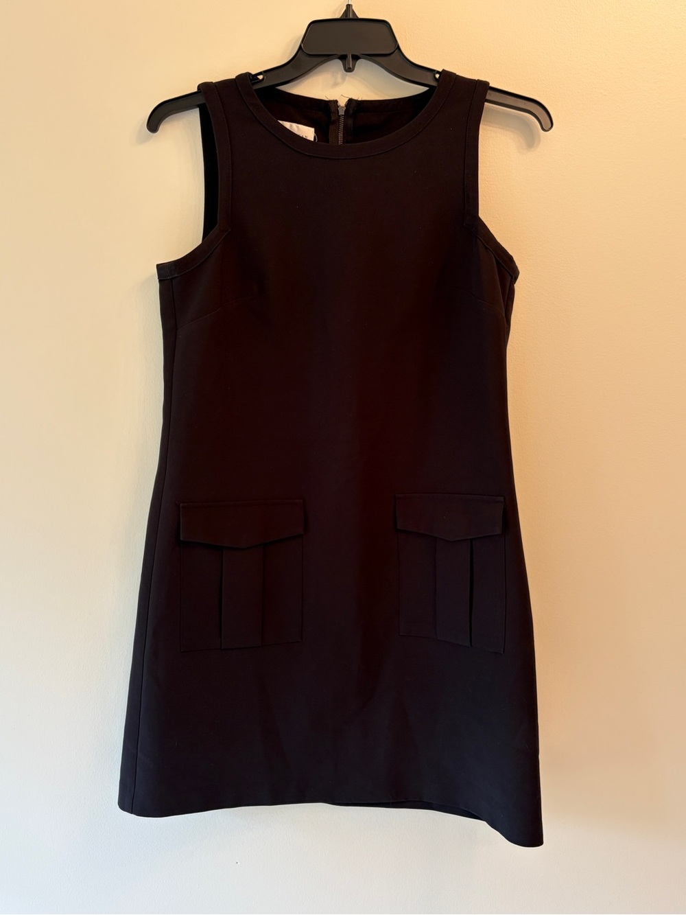 Donna Morgan | Classic Women’s Sleeveless Black Shift Dress with Front Pockets
